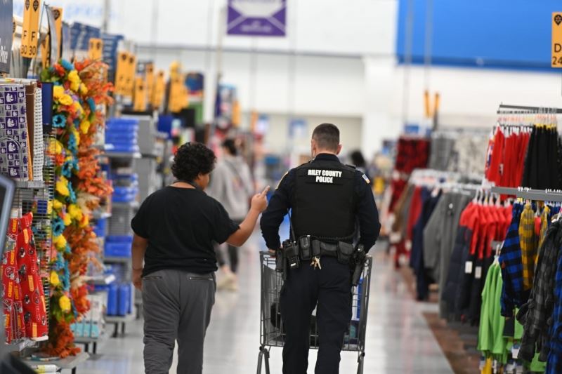 Police Officer Purchasing Gifts