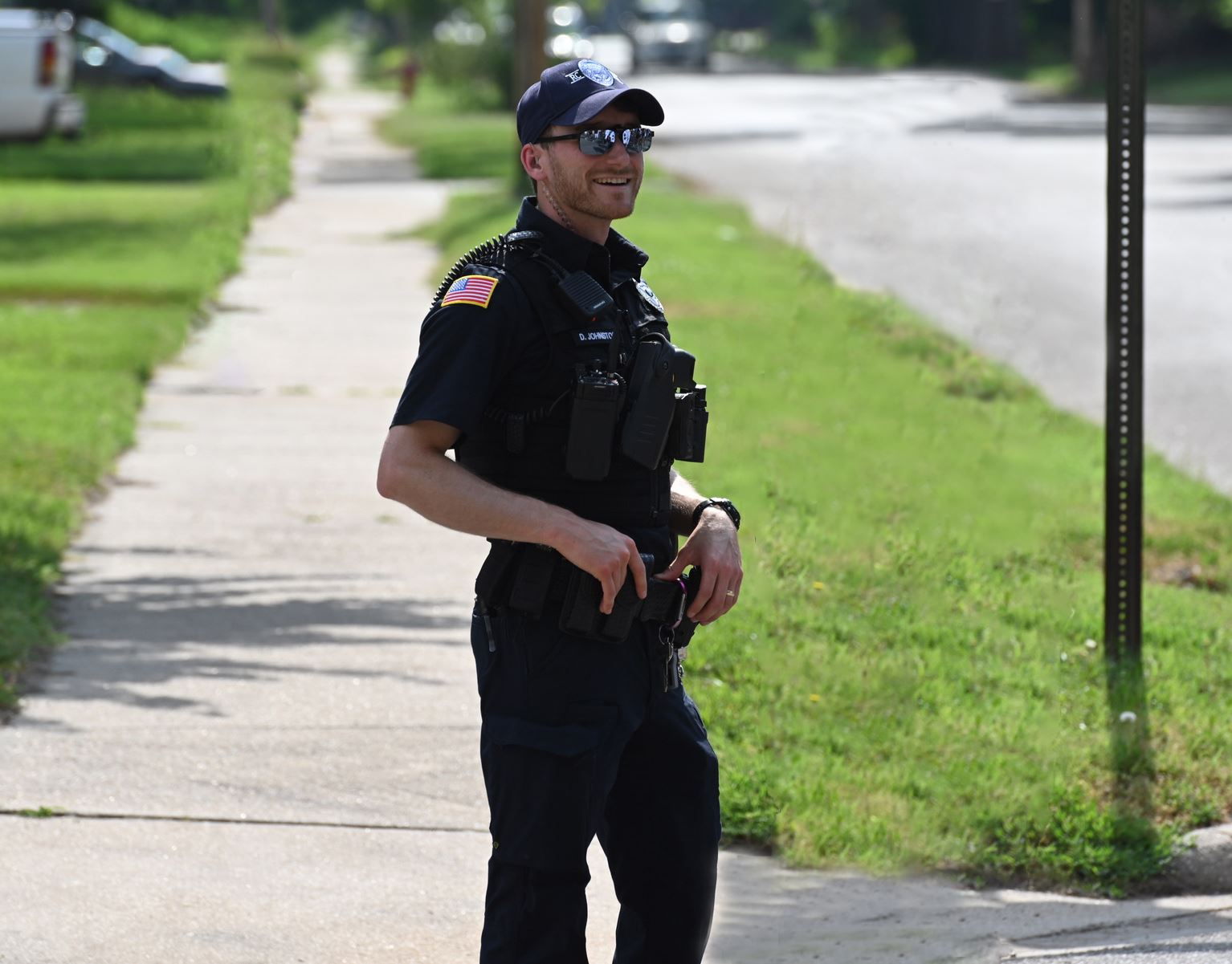 Police Officer with a Black Uniform and Cap